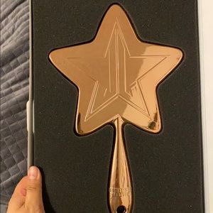 Hand held mirror